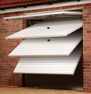 Tilt-up canopy garage door
